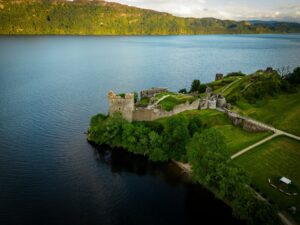 a castle on a small island in the middle of a lake
